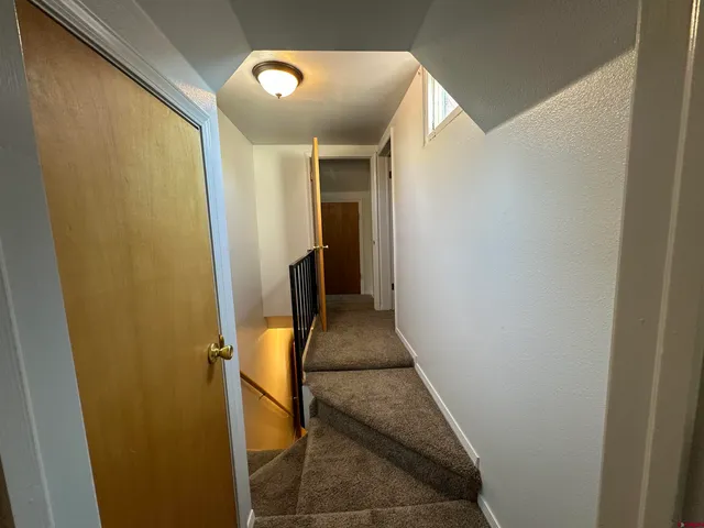 a hallway with sliding door