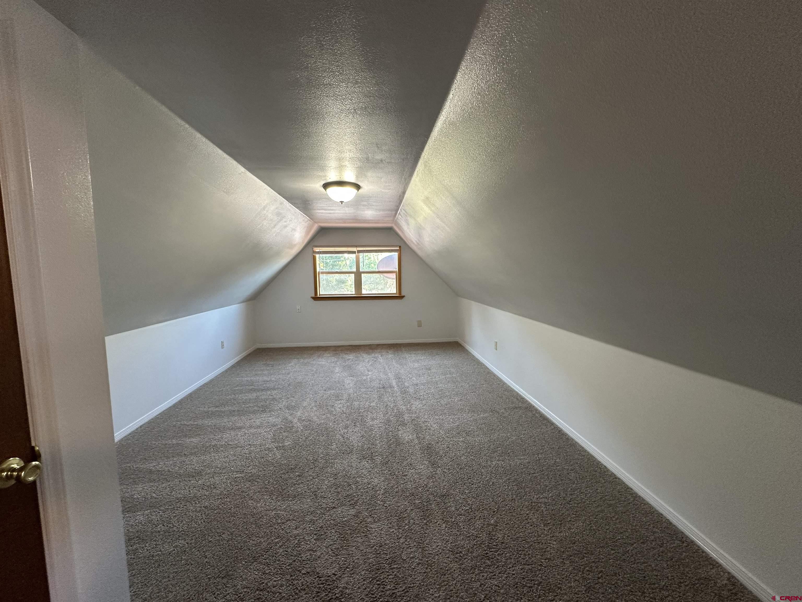 490 West Main Street Cedaredge, CO 81413 - Photo 27 of 31 a view of an empty room with a window