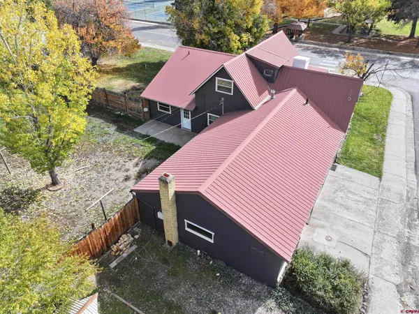 a view of a yard with a patio