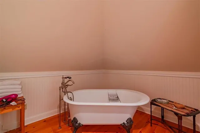 a view of a backyard with chairs