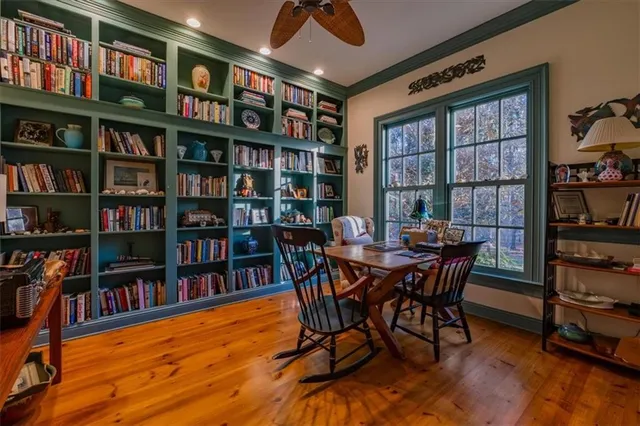a bed room with a bed furniture and a window