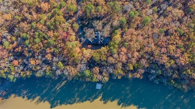 a view of a lake with a house