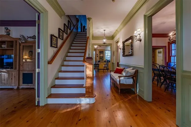 a view of a deck with couches and wooden floor
