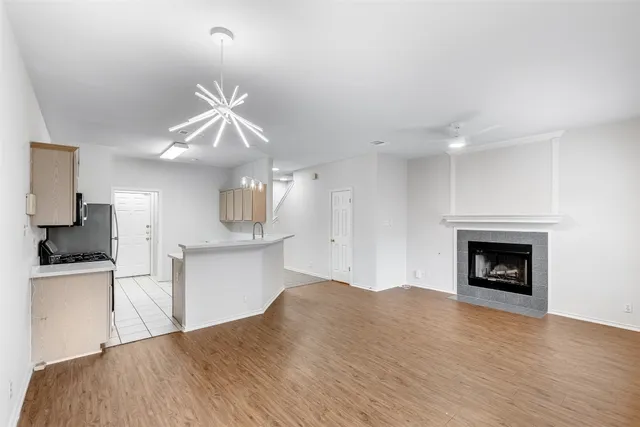 a bedroom with a bed and a fireplace