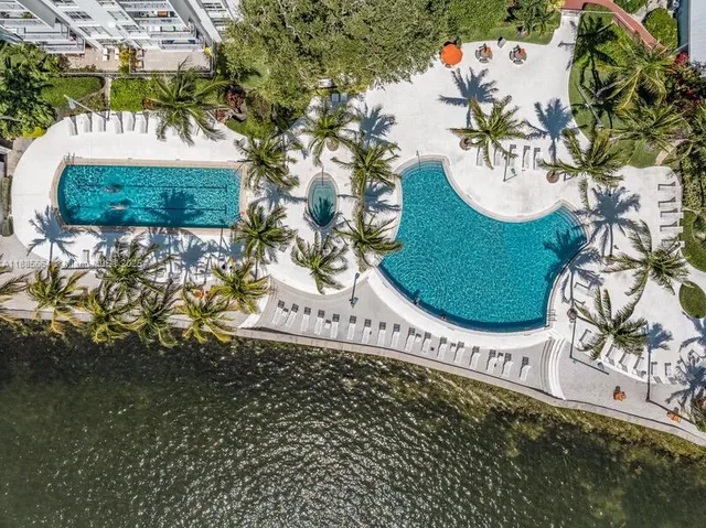 a view of a swimming pool and lake view