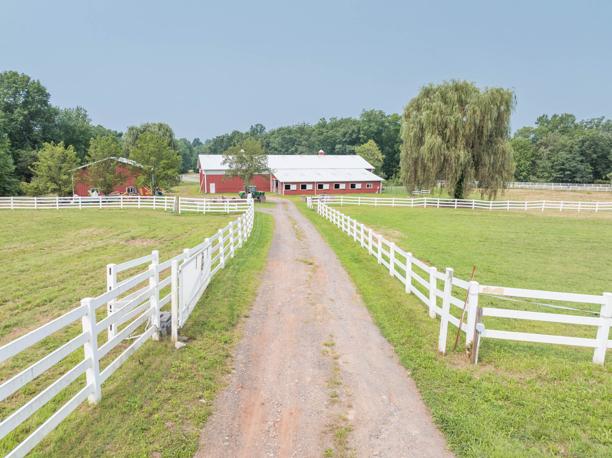 a view of a swimming pool and a yard
