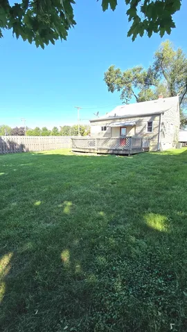 a view of a lush green field
