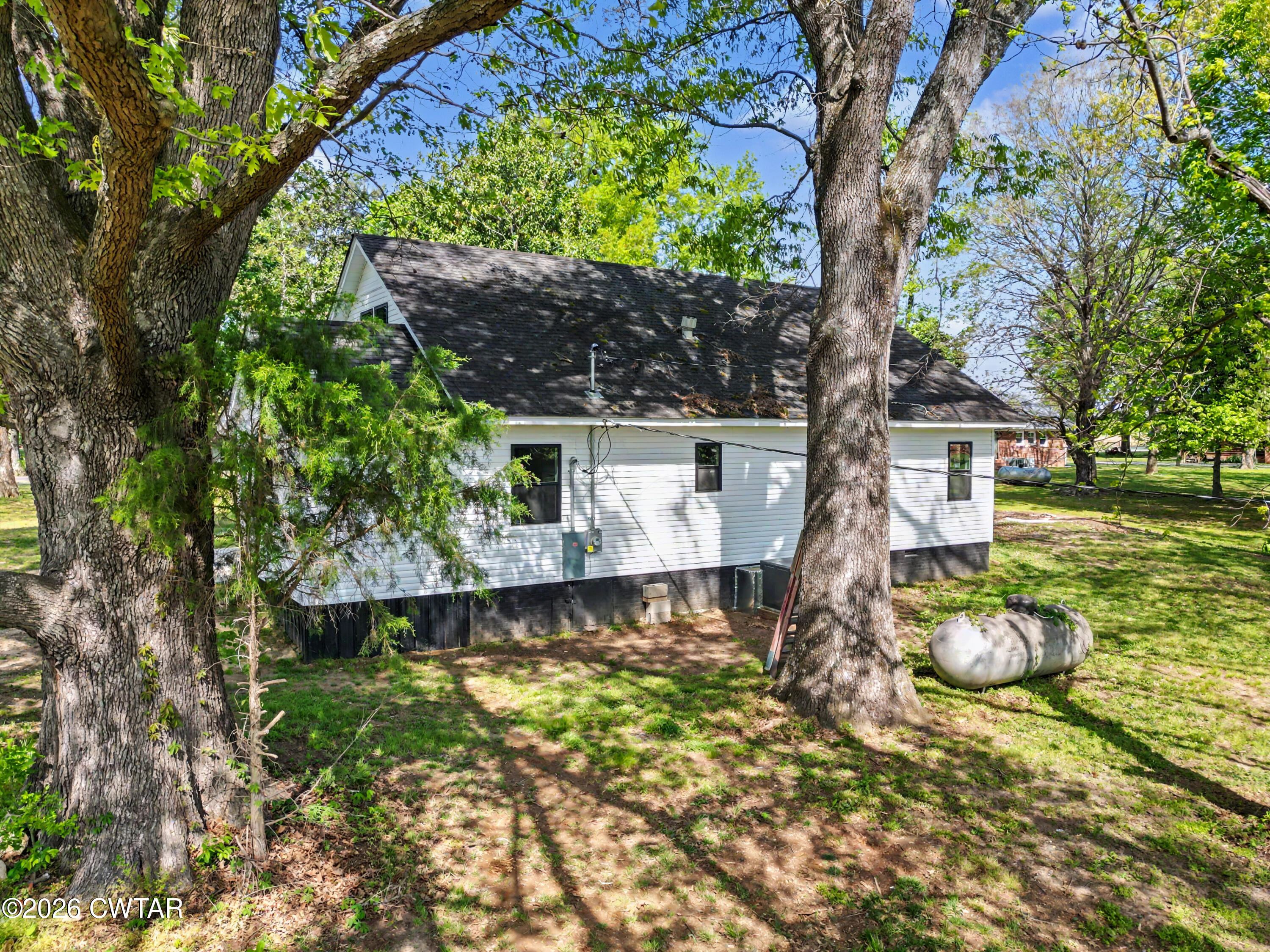 4177 Gum Flat Road Bells, TN 38006 - Photo 6 of 30 a view of a house with a yard