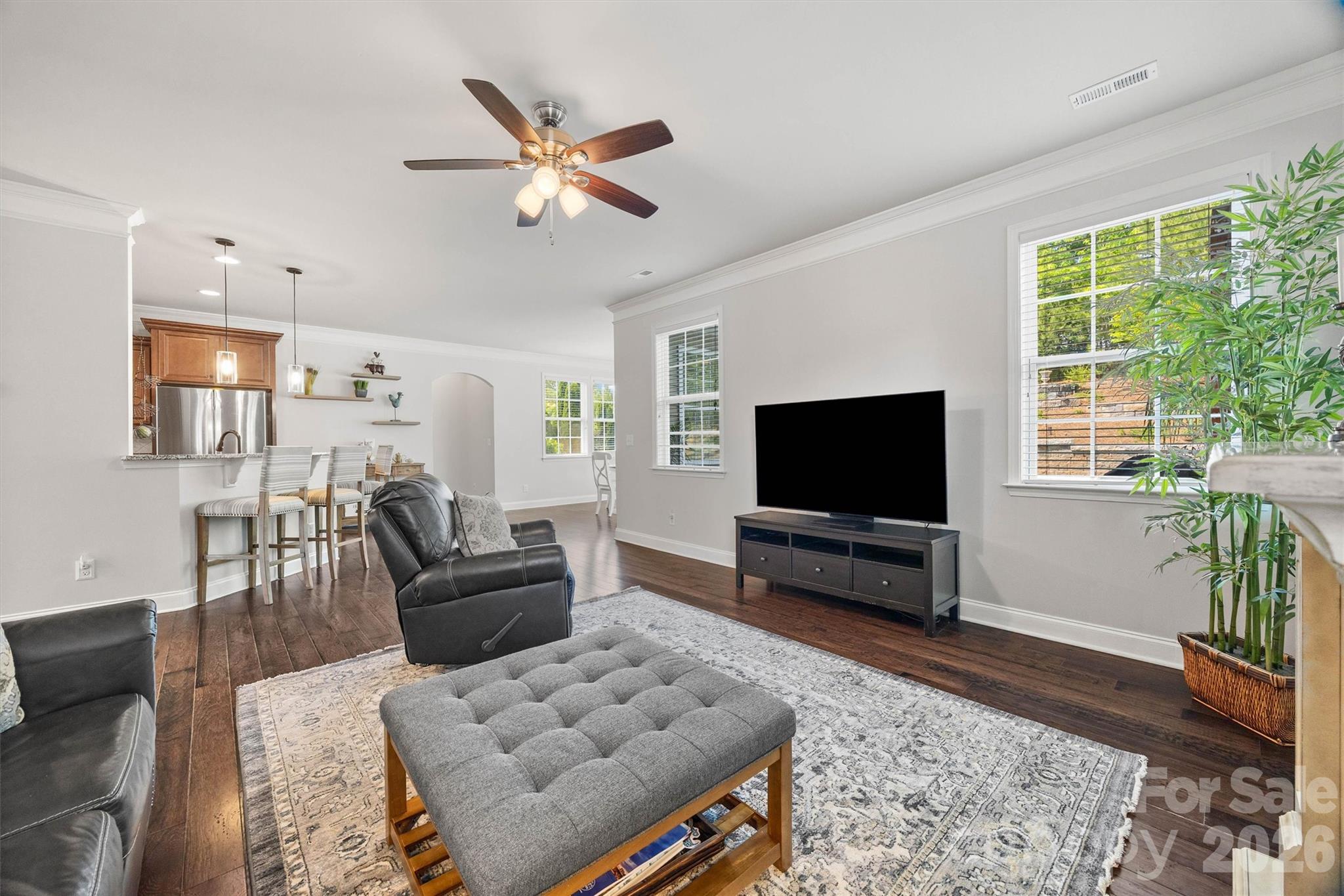 299 Annatto Way Tega Cay, SC 29708 - Photo 18 of 46 a living room with furniture and a flat screen tv