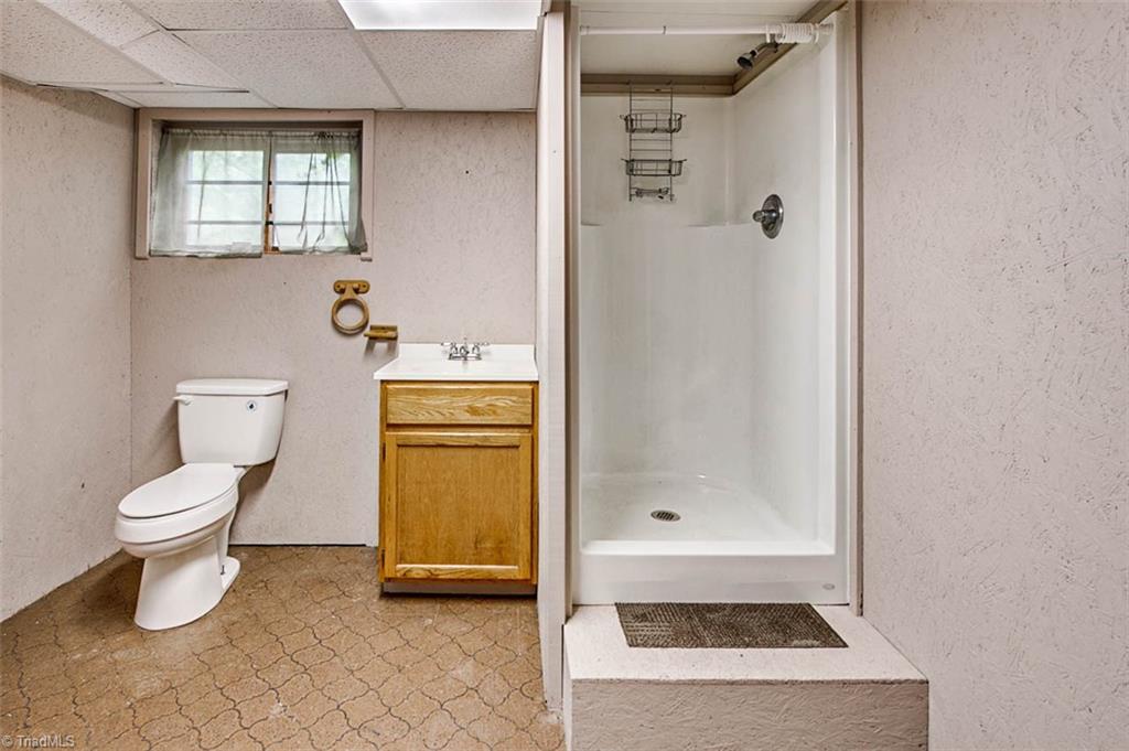1896 Spero Road Asheboro, NC 27205 - Photo 22 of 29 Basement full bath w/shower (not counted in sq footage- ceiling height less than 7')