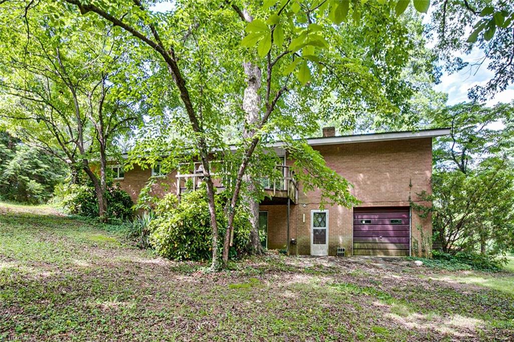1896 Spero Road Asheboro, NC 27205 - Photo 25 of 29 Exterior back, single basement garage
