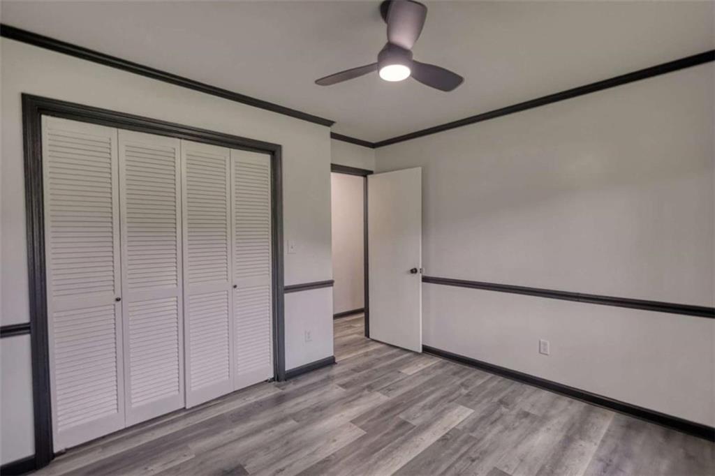 555 Joy Street Jackson, GA 30233 - Photo 37 of 56 a view of empty room with wooden floor