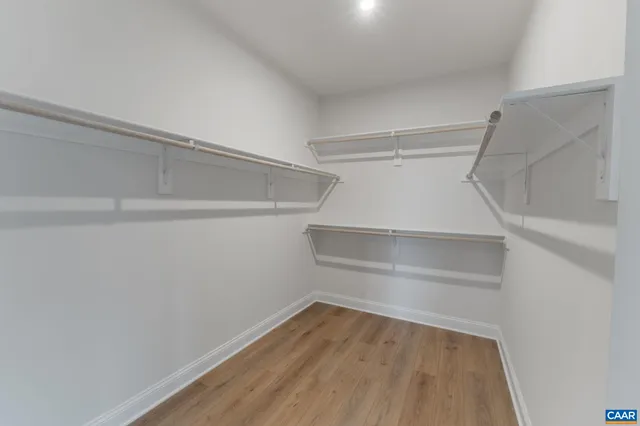 a view of an empty walk in closet