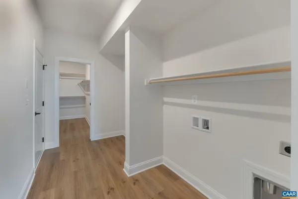a view of entryway with wooden floor