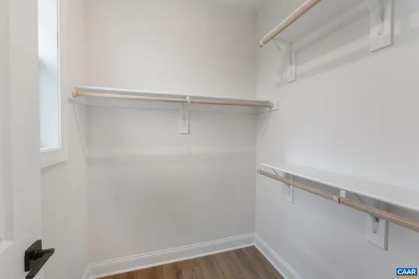 a view of an empty walk in closet
