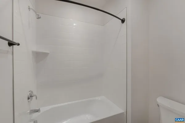 a close view of a bathtub in bathroom