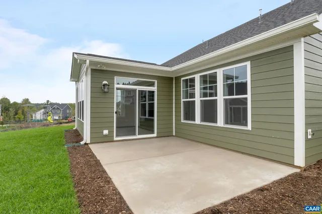 a house with yard in front of it