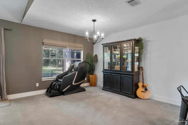 a kitchen with appliances a sink and cabinets