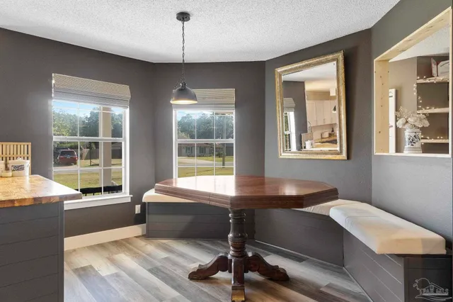 a kitchen with a sink stove and refrigerator
