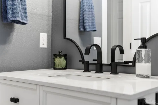 a bed room with a bed and a tv