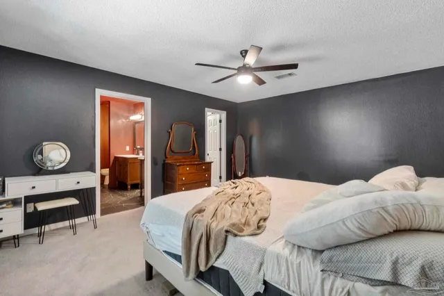 a room with furniture and wooden floor