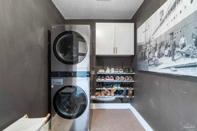a building outdoor space with patio furniture and potted plants