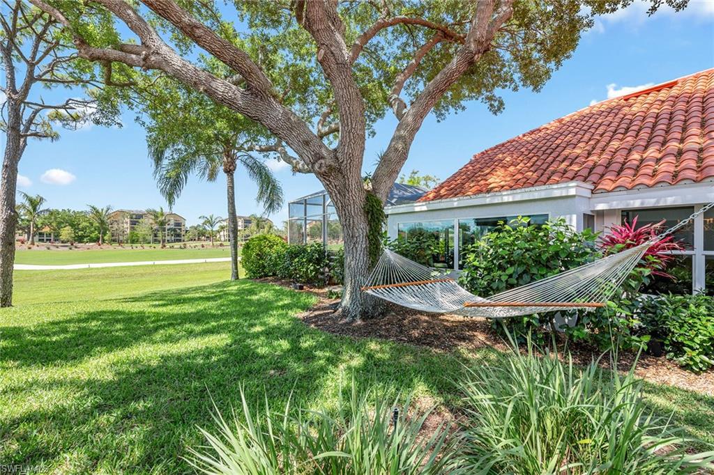 116 Napa Ridge Way Naples, FL 34119 - Photo 20 of 28 a view of an outdoor space with a lake view