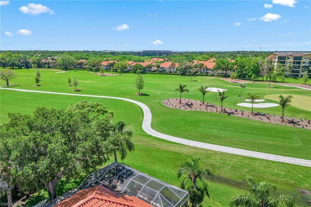 116 Napa Ridge Way Naples, FL 34119 - Photo 24 of 28 a view of a golf course with a park