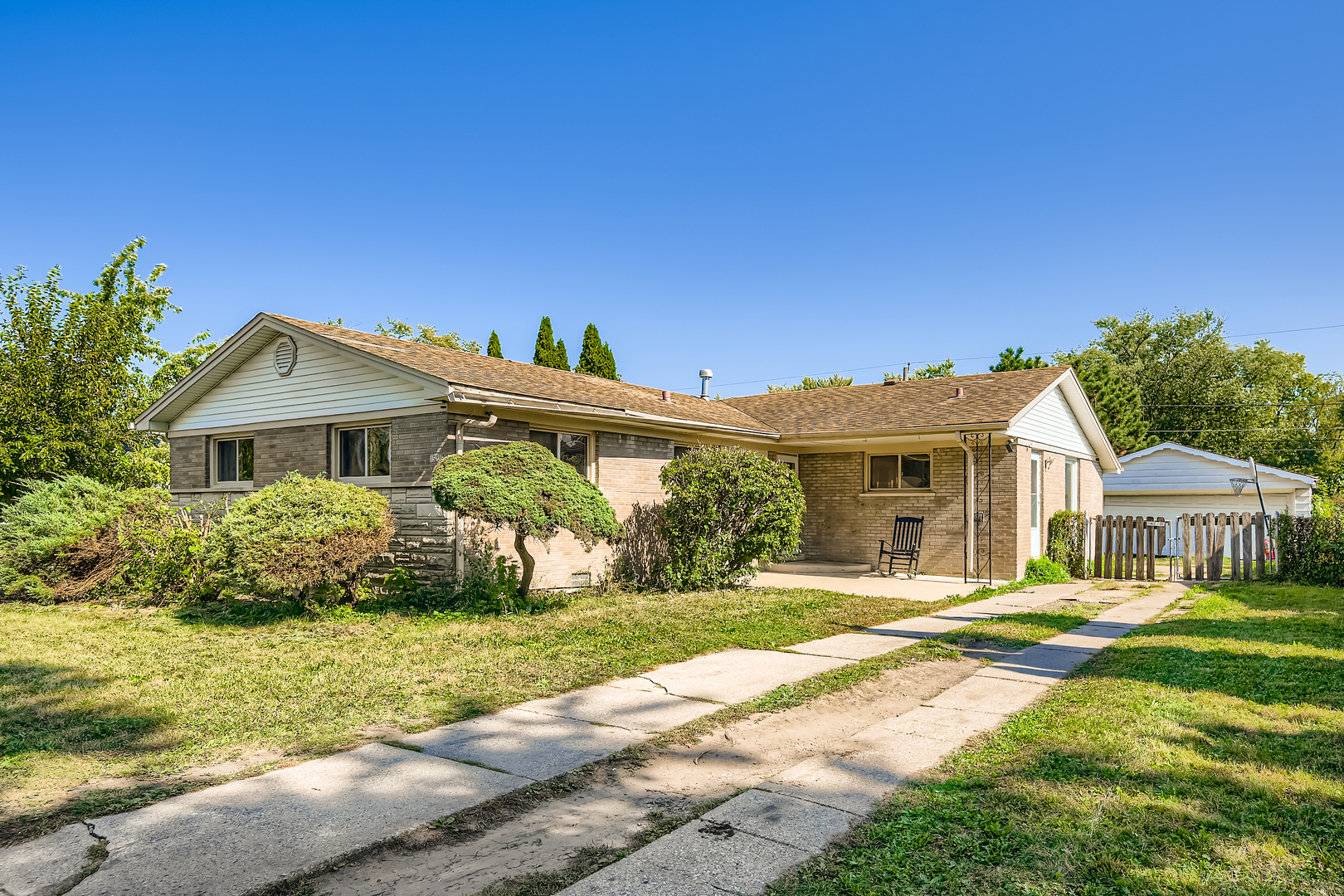 15235 Lawndale Avenue Midlothian, IL 60445 - Photo 1 of 1 a front view of a house with a yard