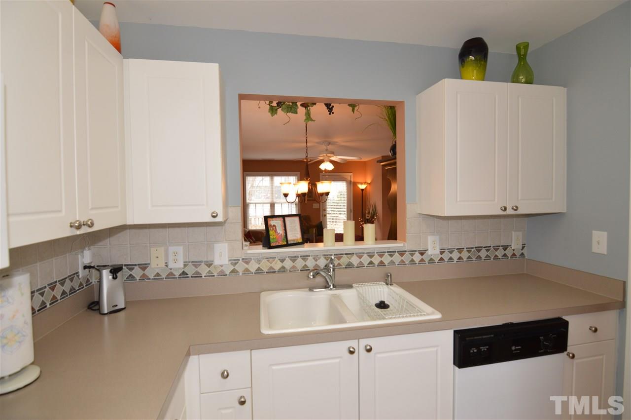2409 Pumpkin Ridge Way Raleigh, NC 27604 - Photo 5 of 18 Has a pass through to the dining area