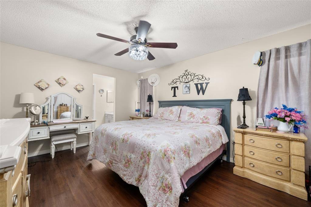 443 Foxdale Road Lake Placid, FL 33852 - Photo 15 of 31 a bedroom with a bed and a dresser