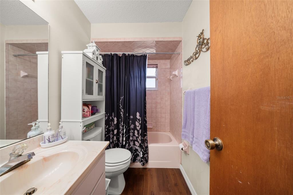 443 Foxdale Road Lake Placid, FL 33852 - Photo 22 of 31 a bathroom with a sink toilet and shower