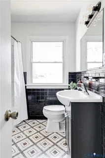 a bathroom with a sink and a toilet