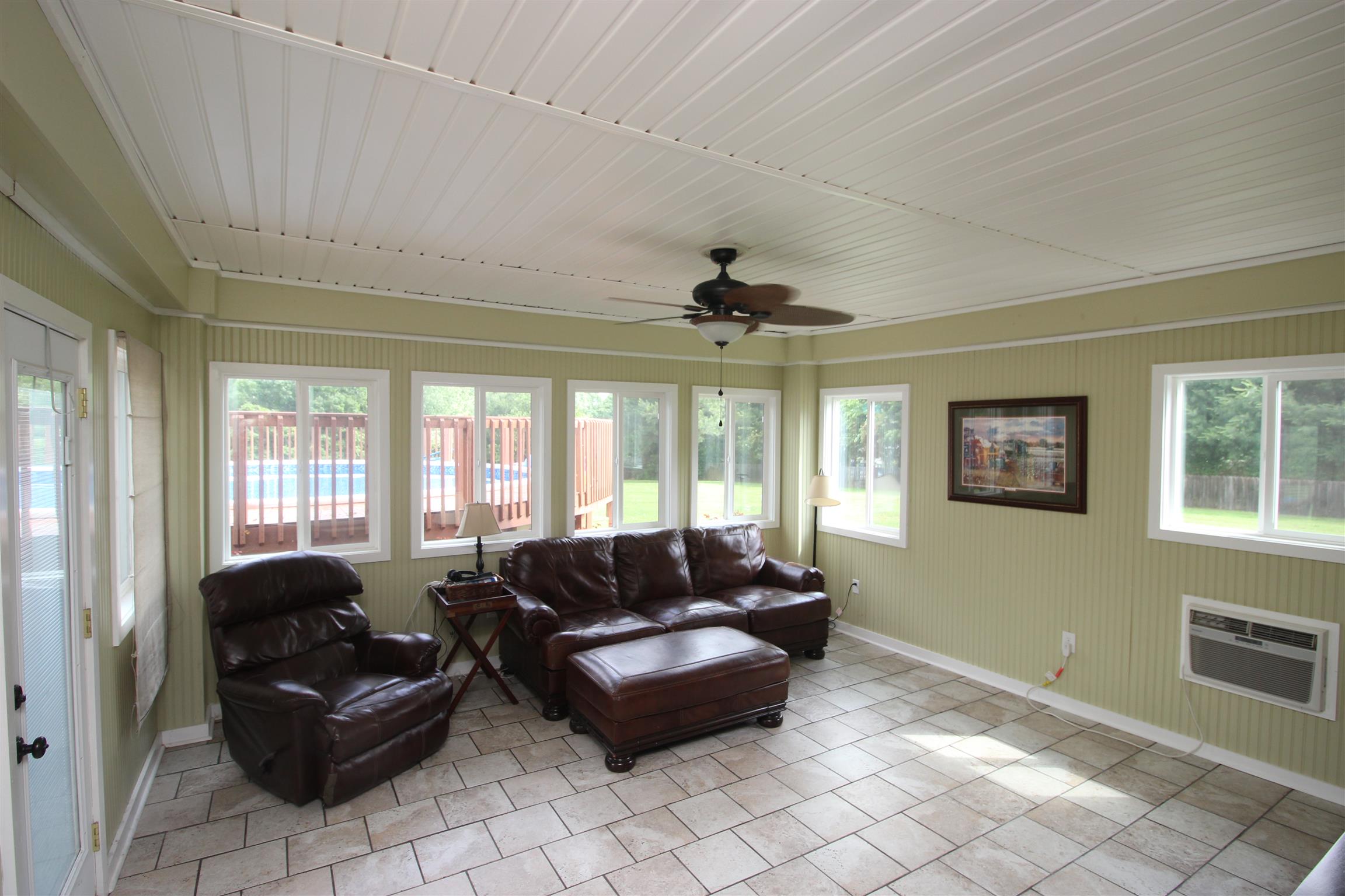 1074 Yellow Creek Road Dickson, TN 37055 - Photo 18 of 24 Florida room off great room with a view of the pool and backyard