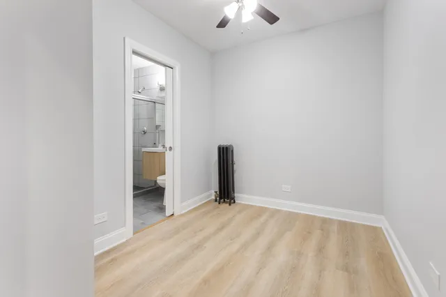 an empty room with a bathroom