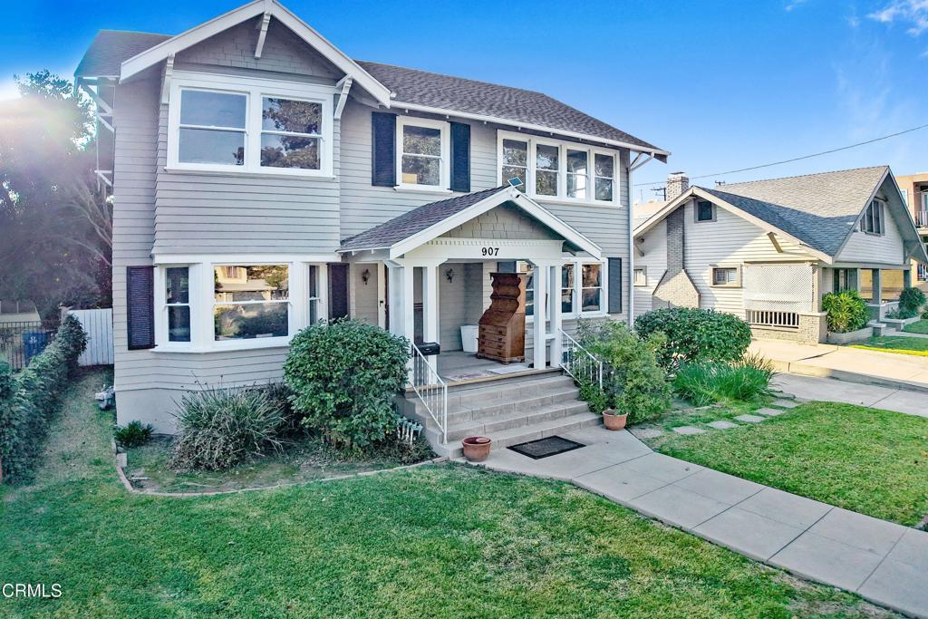 907 North Stoneman Avenue Alhambra, CA 91801 - Photo 15 of 19 a front view of a house with a yard
