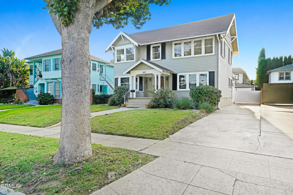 907 North Stoneman Avenue Alhambra, CA 91801 - Photo 17 of 19 a front view of a house with garden