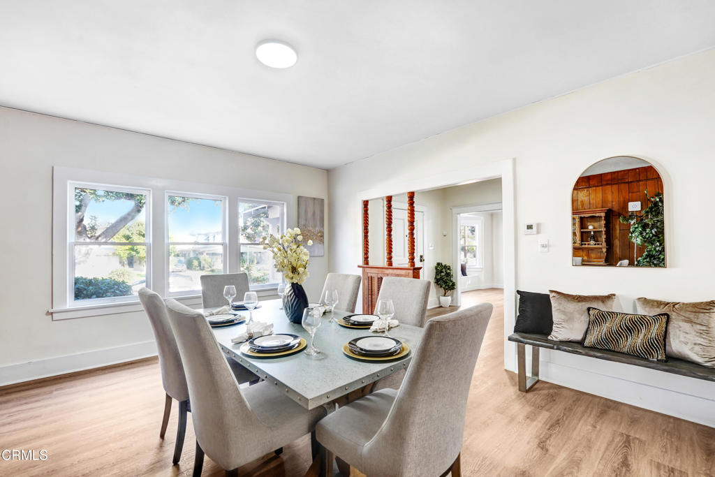 907 North Stoneman Avenue Alhambra, CA 91801 - Photo 4 of 19 a view of a dining room with furniture window and wooden floor