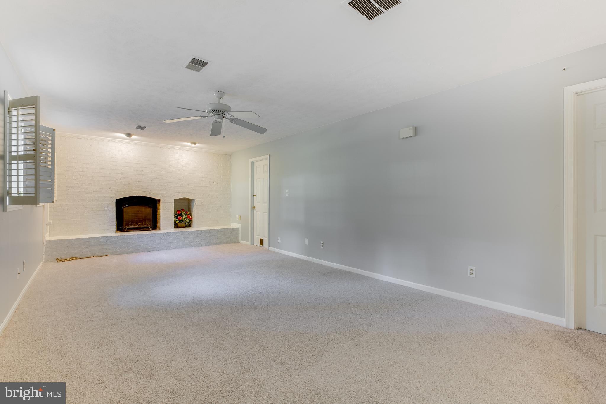 6727 Kelly Road Warrenton, VA 20187 - Photo 36 of 53 Finished Basement with Fireplace new carpet 8/20