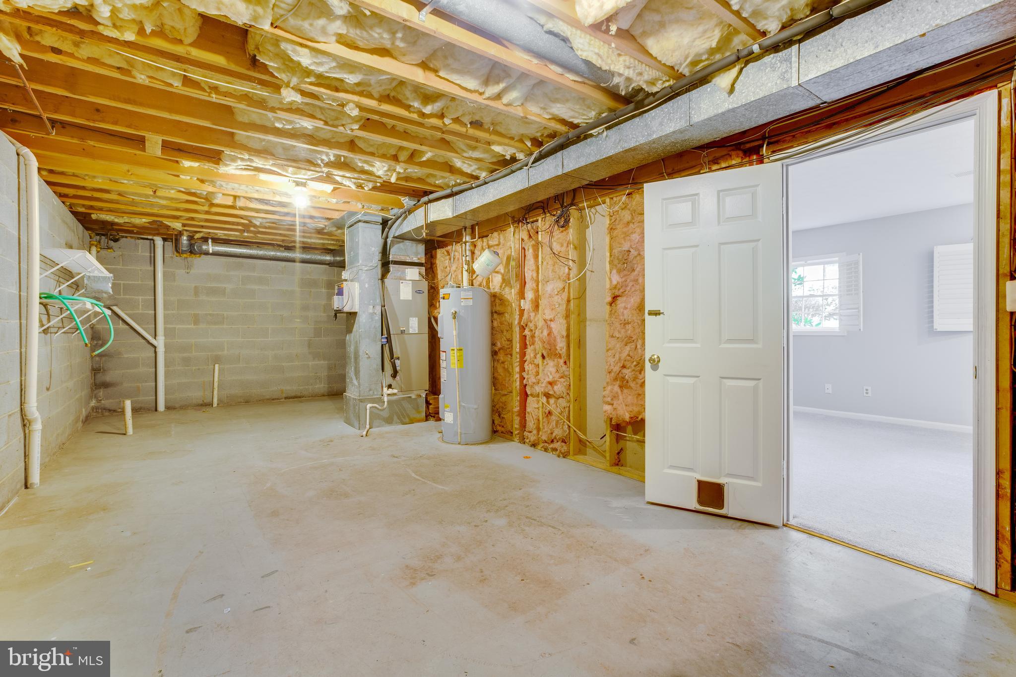 6727 Kelly Road Warrenton, VA 20187 - Photo 39 of 53 Basement storage area - New HW Heater 2019