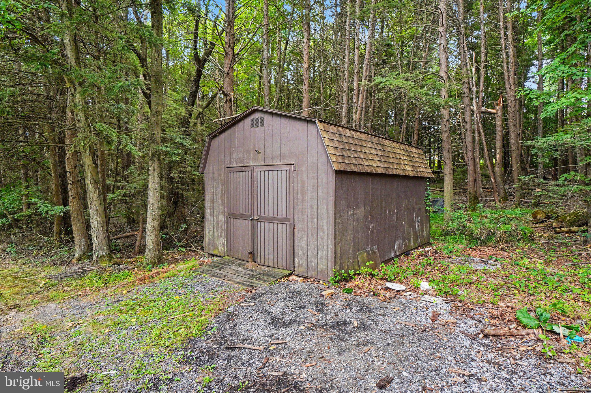 40 Montebello Road Duncannon, PA 17020 - Photo 25 of 28 Charming shed nestled in lush woods.