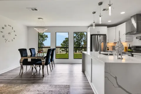 a view of kitchen with breakfast area