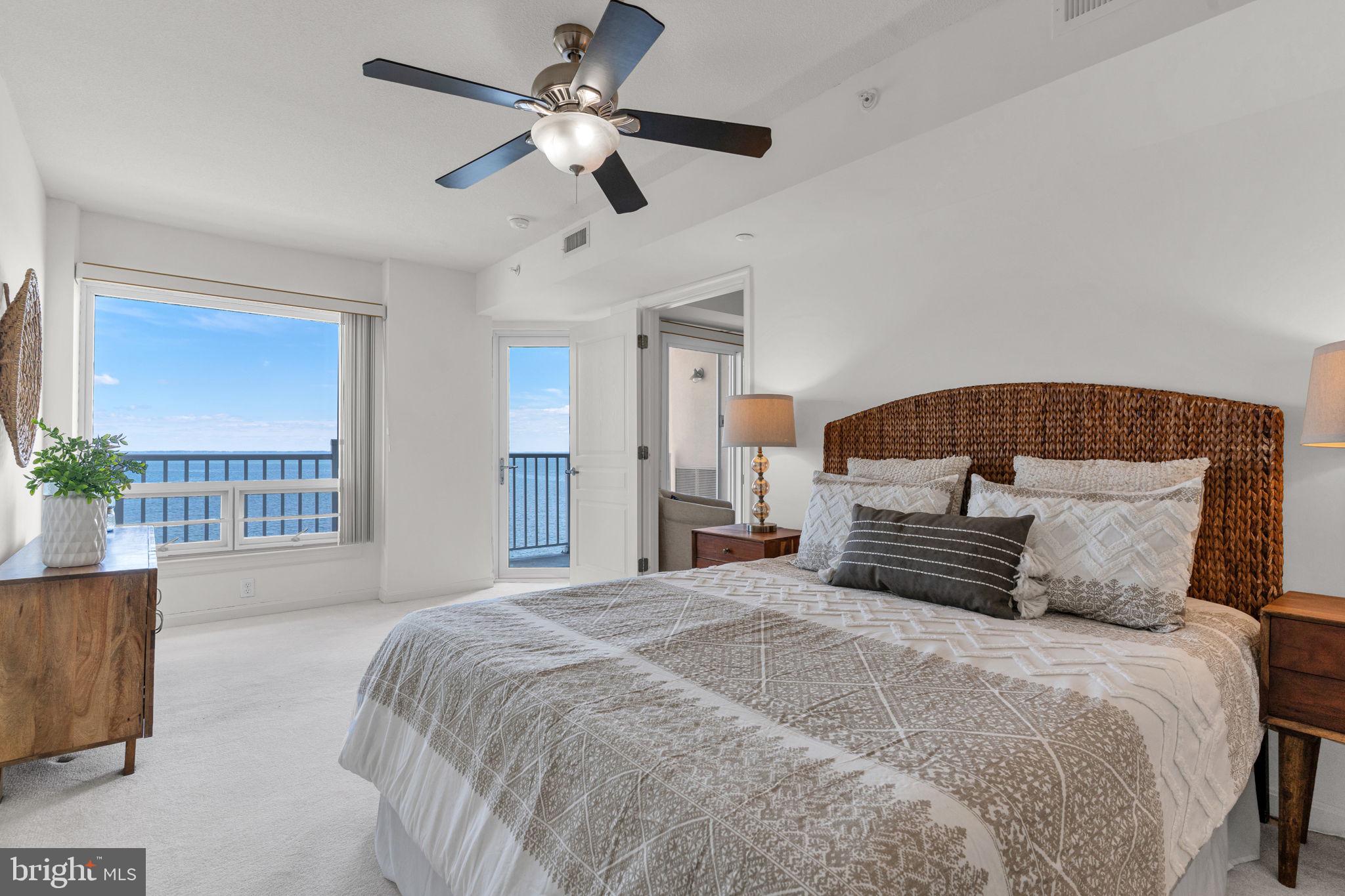 8501 Bayside Road, Unit 605 Chesapeake Beach, MD 20732 - Photo 18 of 30 Primary bedroom with a view of the Bay and sunrise