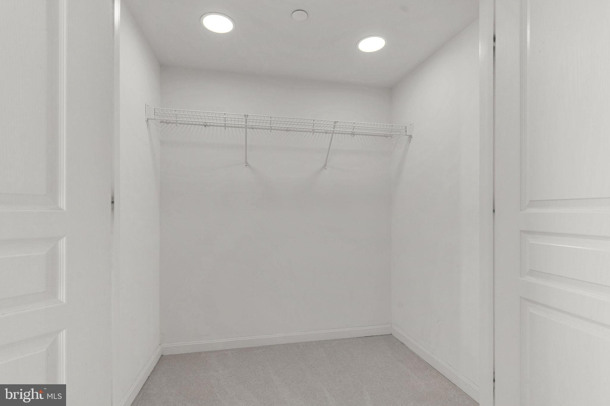 8501 Bayside Road, Unit 605 Chesapeake Beach, MD 20732 - Photo 20 of 30 walk-in primary closet