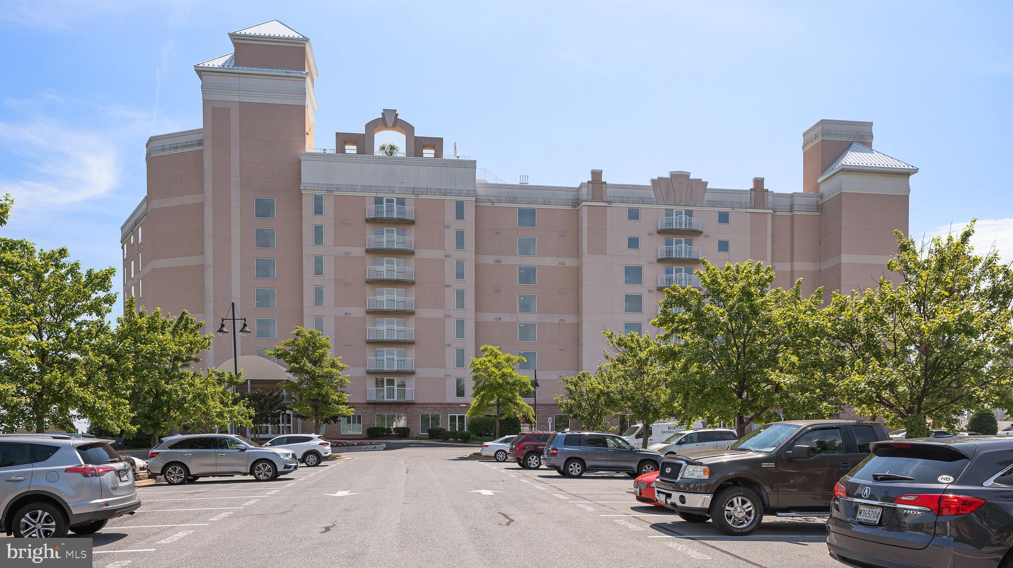 8501 Bayside Road, Unit 605 Chesapeake Beach, MD 20732 - Photo 2 of 30 a cars parked in front of a building