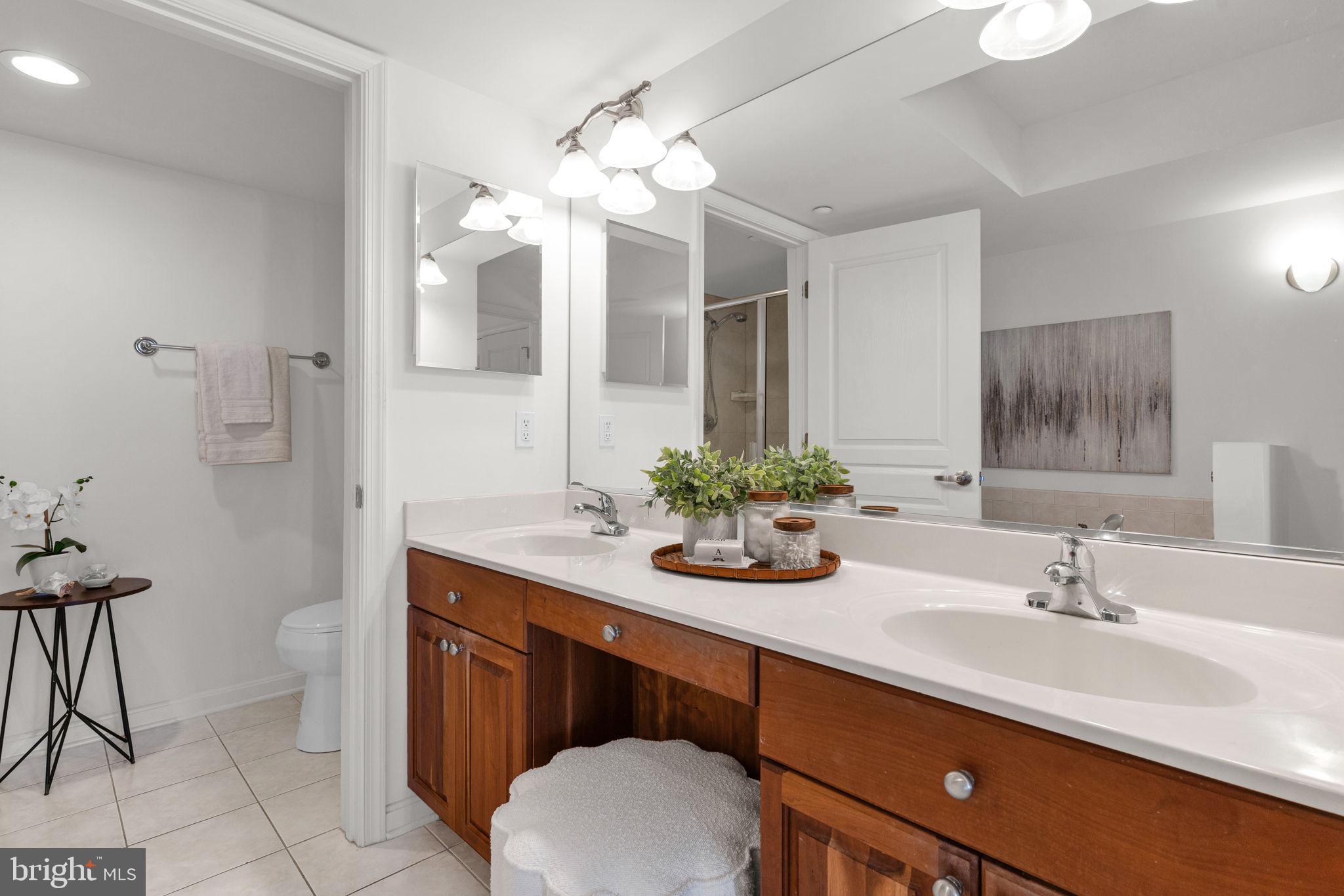 8501 Bayside Road, Unit 605 Chesapeake Beach, MD 20732 - Photo 21 of 30 Primary bath with double sinks and soaking tub