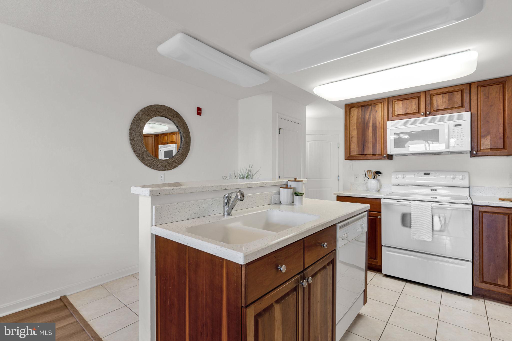 8501 Bayside Road, Unit 605 Chesapeake Beach, MD 20732 - Photo 10 of 30 Kitchen with ceramic tile floor