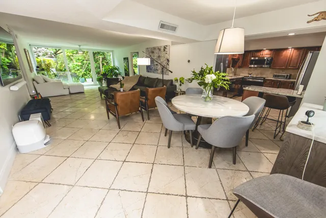 a living room with patio furniture