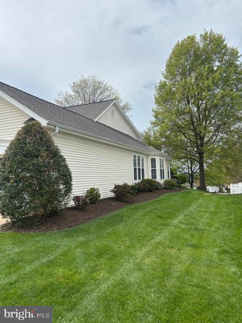 17657 Glass Ridge Place Gainesville, VA 20155 - Photo 3 of 4 Charming home with lush green lawn.