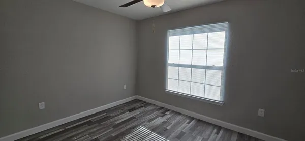 an empty room with a window